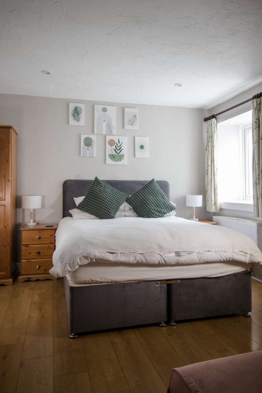 A double bed in one of the en-suite rooms